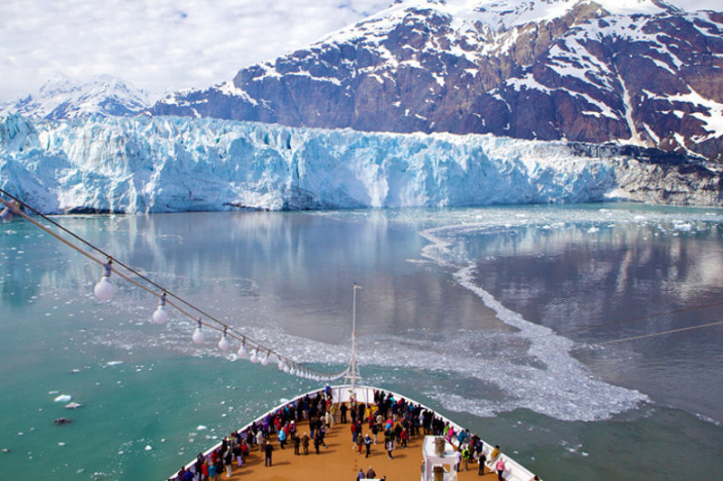 cruise ship in front of glacier alaska