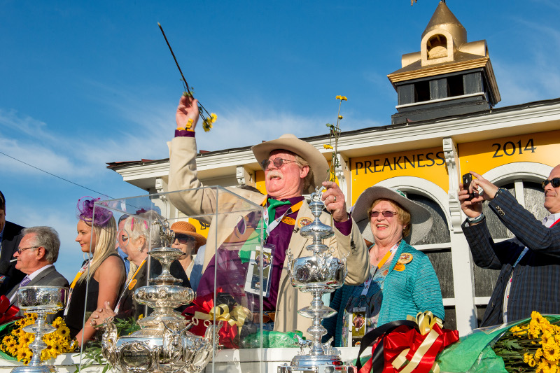 Winners celebrate with the Woodlawn Trophy