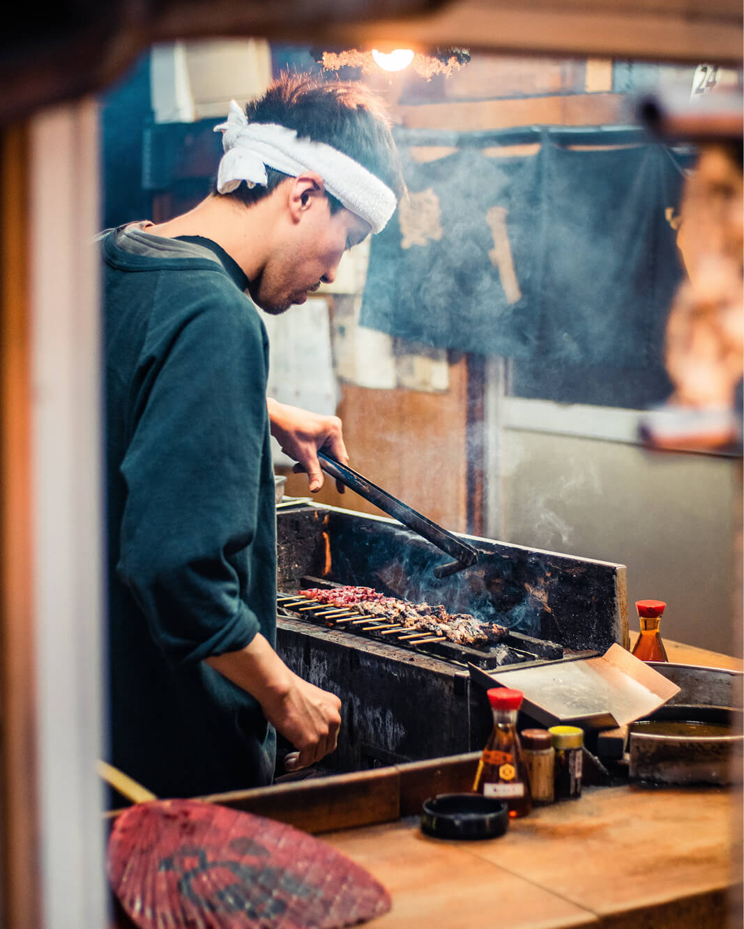 Chef preparing fresh food at a Tokyo market