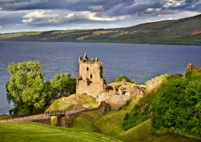 Urquhart Castle keeps watch over Loch Ness where the illusive water monster is said to live. Image: Getty. 