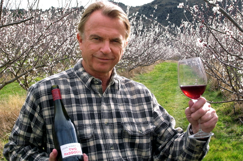 Sam Neill in the apricot orchard of Two Paddocks. Image: Two Paddocks