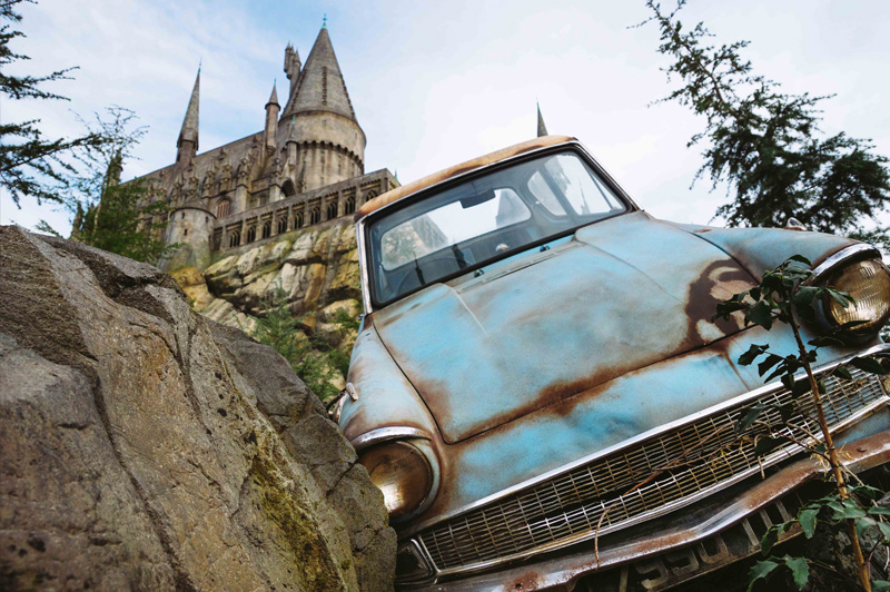 The famous flying Ford Anglia car with Hogwarts Castle in the background. Image: Universal Studios