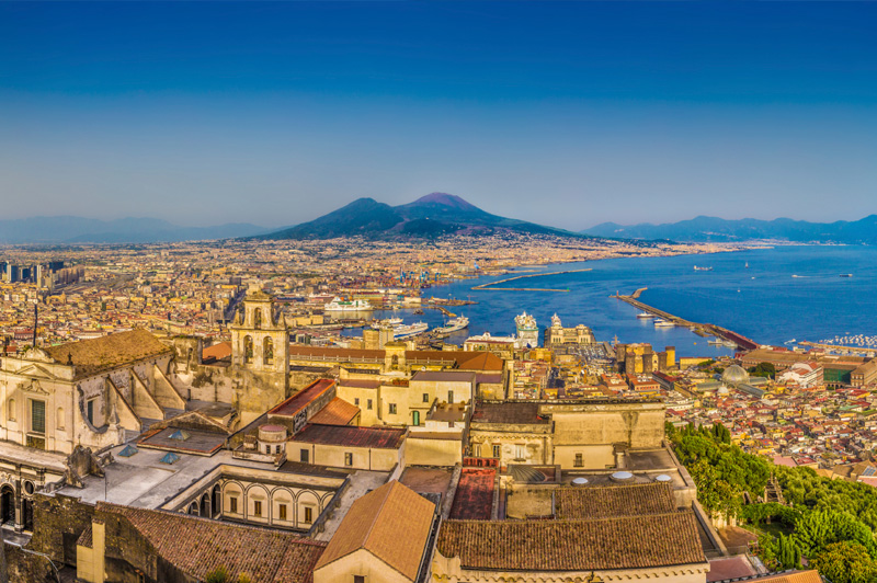The city of Naples with Mount Vesuvius at sunset. Image: Getty